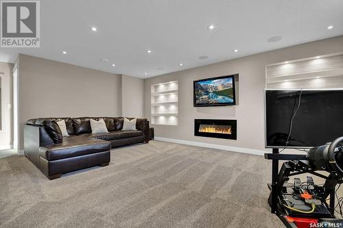 3502 Green Creek Road, Regina, SK - Indoor Photo Showing Living Room With Fireplace