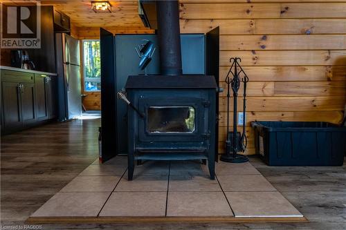 149 Tammy'S Cove Road, Miller Lake, ON - Indoor Photo Showing Other Room With Fireplace