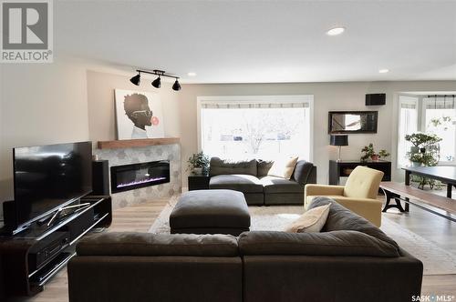 114 Bourgonje Crescent, Saskatoon, SK - Indoor Photo Showing Living Room With Fireplace