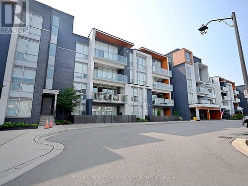 #112 -3028 Creekshore Common, Oakville, ON - Outdoor With Balcony With Facade
