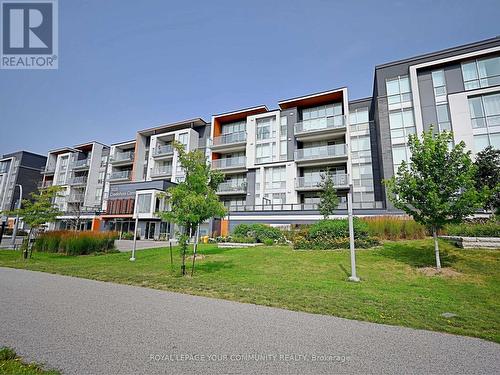 #112 -3028 Creekshore Common, Oakville, ON - Outdoor With Balcony With Facade