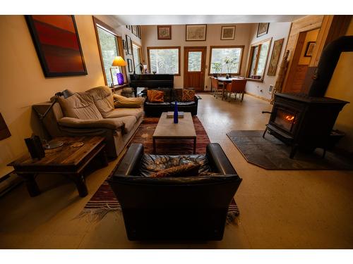 6225 Porto Rico Ymir Road, Ymir, BC - Indoor Photo Showing Living Room With Fireplace