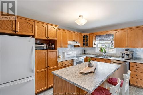 42 Firmin Cres, Dieppe, NB - Indoor Photo Showing Kitchen With Double Sink