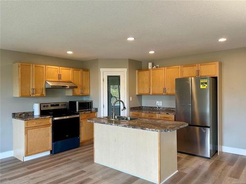 406 Alpen Way, Nanaimo, BC - Indoor Photo Showing Kitchen With Stainless Steel Kitchen With Double Sink