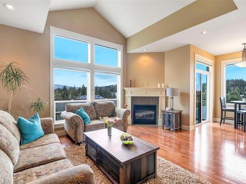 19-551 Bezanton Way, Colwood, BC - Indoor Photo Showing Living Room With Fireplace