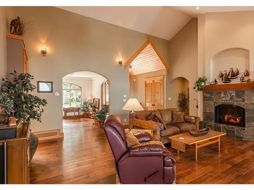 5151 Island Hwy West, Qualicum Beach, BC - Indoor Photo Showing Living Room With Fireplace