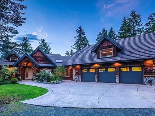 5151 Island Hwy West, Qualicum Beach, BC - Outdoor With Facade