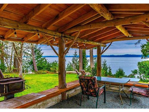 5151 Island Hwy West, Qualicum Beach, BC - Outdoor With Body Of Water With Deck Patio Veranda