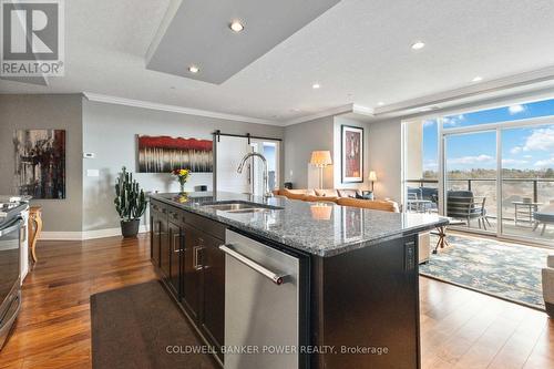 909 - 240 Villagewalk Boulevard, London, ON - Indoor Photo Showing Kitchen With Double Sink With Upgraded Kitchen