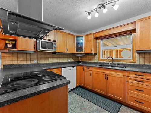 3904 32 Avenue, Vernon, BC - Indoor Photo Showing Kitchen With Double Sink