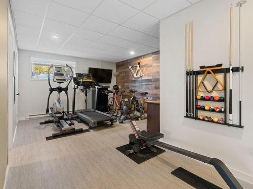 Exercise room - 23 Rue De La Montagne-Verte, Sainte-Marguerite-Du-Lac-Masson, QC - Indoor Photo Showing Gym Room