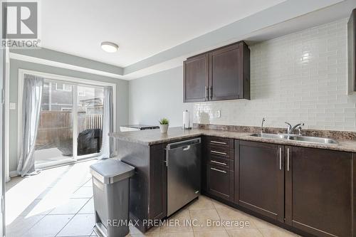 20 - 8 Bradley Avenue N, Hamilton, ON - Indoor Photo Showing Kitchen With Double Sink