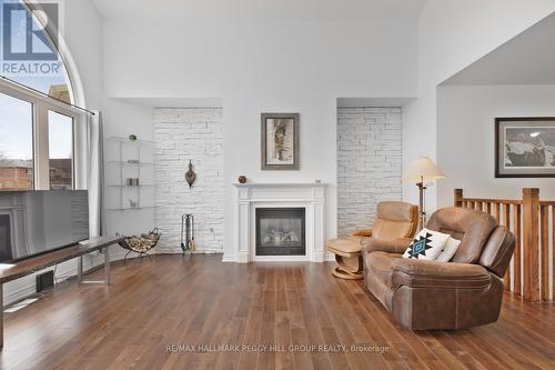 23 Christy Drive, Wasaga Beach, ON - Indoor Photo Showing Living Room With Fireplace