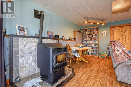 2952 Prospector Road, 150 Mile House, BC - Indoor Photo Showing Other Room With Fireplace