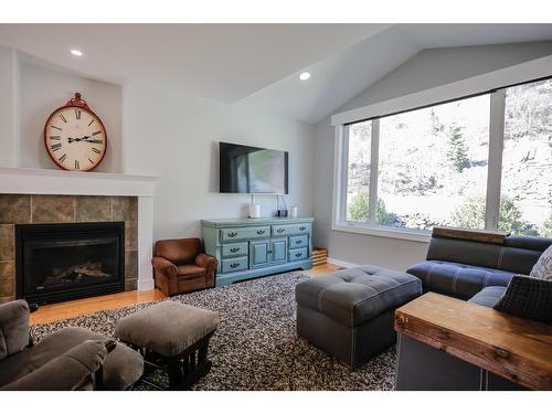 5820 Woodland Drive, Taghum, BC - Indoor Photo Showing Living Room With Fireplace
