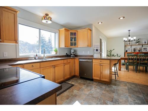 5820 Woodland Drive, Taghum, BC - Indoor Photo Showing Kitchen With Double Sink