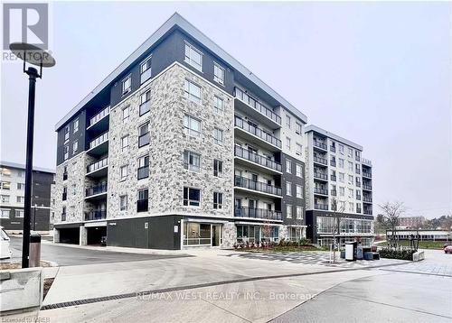 G212 - 275 Larch Street, Waterloo, ON - Outdoor With Balcony With Facade