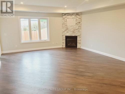 189 Wilmer Avenue, Gananoque, ON - Indoor Photo Showing Living Room With Fireplace