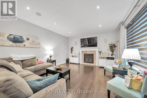 699 Normandy Drive, Woodstock, ON - Indoor Photo Showing Living Room With Fireplace