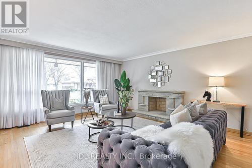 14 Shadetree Cres, Toronto, ON - Indoor Photo Showing Living Room With Fireplace