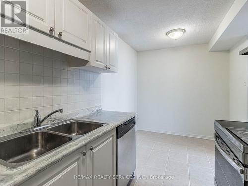 #609 -2900 Battleford Rd, Mississauga, ON - Indoor Photo Showing Kitchen With Double Sink