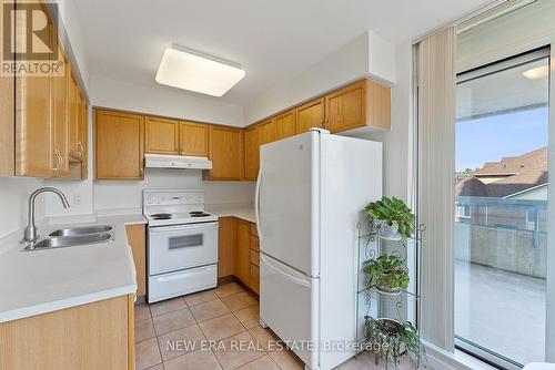 #303 -5 Emerald Lane, Vaughan, ON - Indoor Photo Showing Kitchen With Double Sink