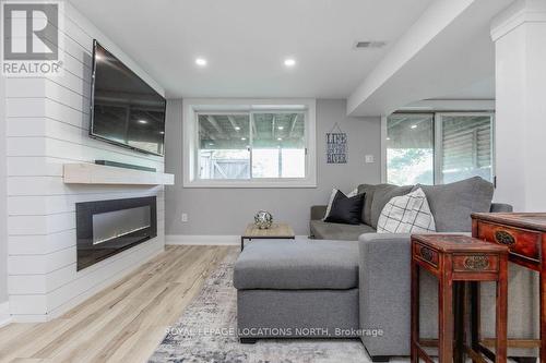 157 Woodland Dr, Wasaga Beach, ON - Indoor Photo Showing Living Room With Fireplace