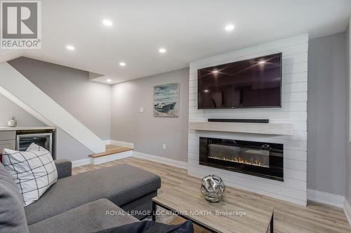 157 Woodland Dr, Wasaga Beach, ON - Indoor Photo Showing Living Room With Fireplace