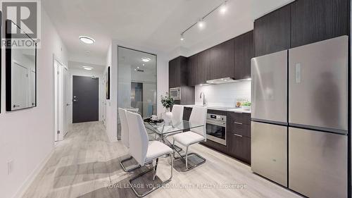 #S409 -8 Olympic Gdn Dr, Toronto, ON - Indoor Photo Showing Kitchen With Upgraded Kitchen