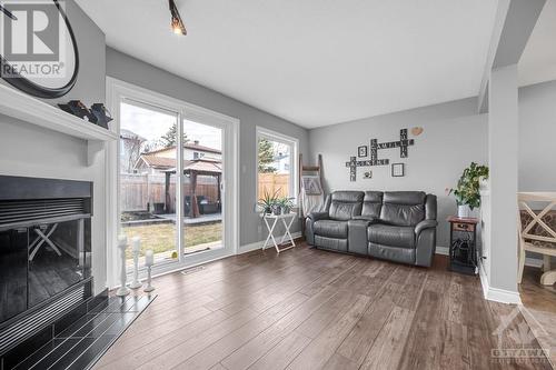 686 Morewood Crescent, Ottawa, ON - Indoor Photo Showing Living Room With Fireplace