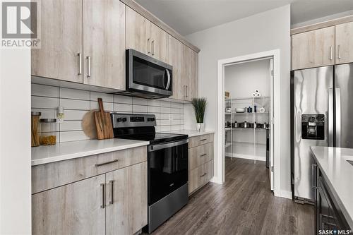 4037 Delhaye Way, Regina, SK - Indoor Photo Showing Kitchen With Upgraded Kitchen
