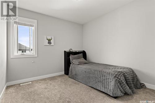 4037 Delhaye Way, Regina, SK - Indoor Photo Showing Bedroom