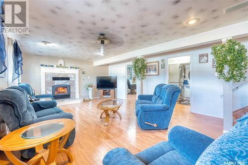 107 2Nd Street W, Pierceland, SK - Indoor Photo Showing Living Room With Fireplace