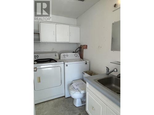 5368 41 Street, Fort Nelson, BC - Indoor Photo Showing Laundry Room