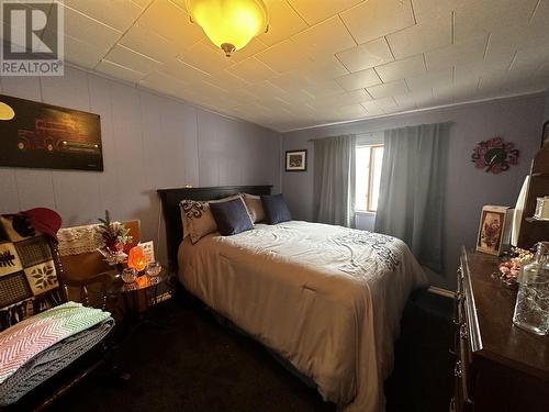 8 Fediw Road, Fort Nelson, BC - Indoor Photo Showing Bedroom