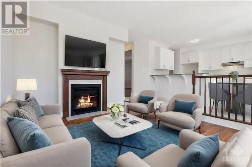 121 Bert Hall Street, Arnprior, ON - Indoor Photo Showing Living Room With Fireplace