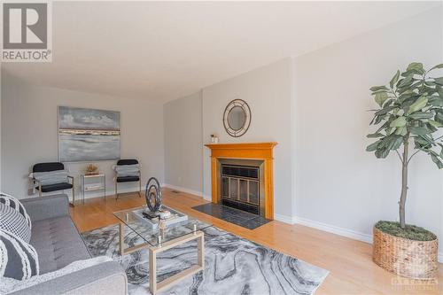 1816 Thornecrest Street, Ottawa, ON - Indoor Photo Showing Living Room With Fireplace
