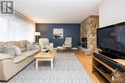22 Cortleigh Drive, Ottawa, ON - Indoor Photo Showing Living Room With Fireplace