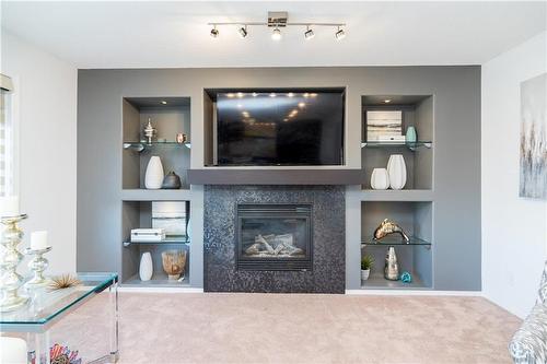 18 Inspiration Place, Winnipeg, MB - Indoor Photo Showing Living Room With Fireplace