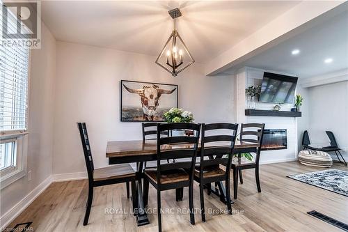 6921 Freeman Street, Niagara Falls, ON - Indoor Photo Showing Dining Room With Fireplace