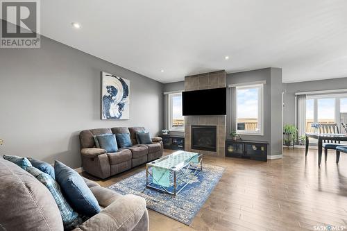 5577 Norseman Crescent, Regina, SK - Indoor Photo Showing Living Room With Fireplace
