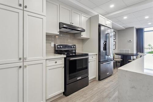 party room - 101 Shoreview Place|Unit #538, Hamilton, ON - Indoor Photo Showing Kitchen With Stainless Steel Kitchen