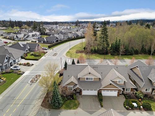 101-1055 Crown Isle Dr, Courtenay, BC - Outdoor With Facade