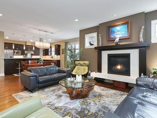 101-1055 Crown Isle Dr, Courtenay, BC - Indoor Photo Showing Living Room With Fireplace