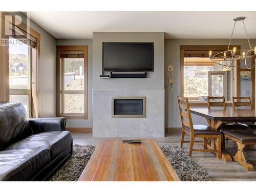 375 Raven Ridge Road Unit# 204, Big White, BC - Indoor Photo Showing Living Room With Fireplace