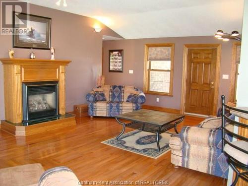 13725 Spence Line, Chatham-Kent, ON - Indoor Photo Showing Living Room With Fireplace