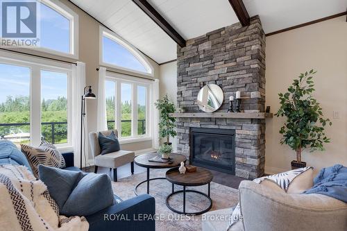 4400 518 Highway East, Kearney, ON - Indoor Photo Showing Living Room With Fireplace