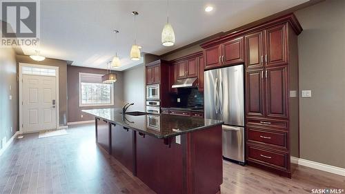64 Stapleford Crescent, Regina, SK - Indoor Photo Showing Kitchen With Stainless Steel Kitchen With Upgraded Kitchen