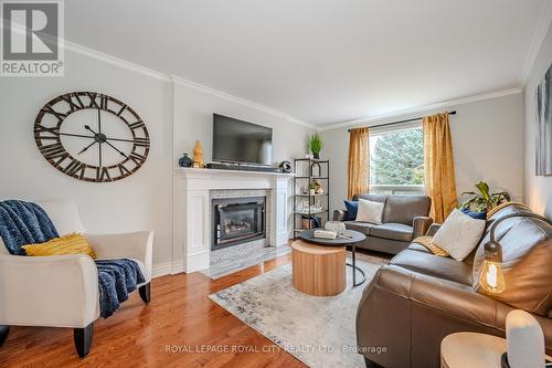 21 Kortright Rd E, Guelph, ON - Indoor Photo Showing Living Room With Fireplace