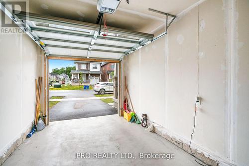 8794 Sourgum Avenue, Niagara Falls, ON - Indoor Photo Showing Garage